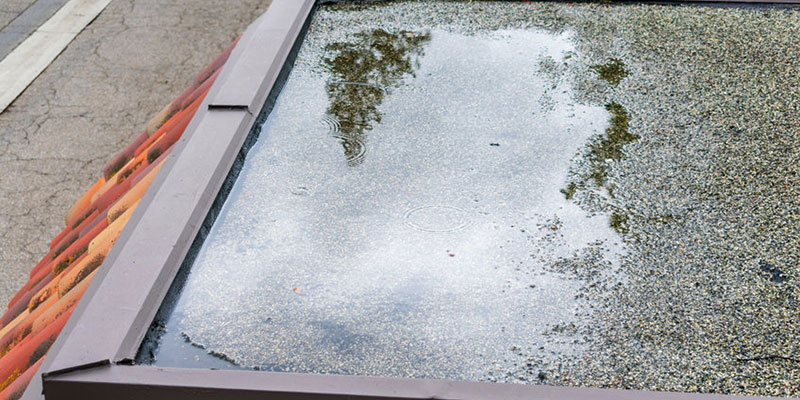 KR-Roofing-Repairs-Pooling-1 Pools of water on a roof